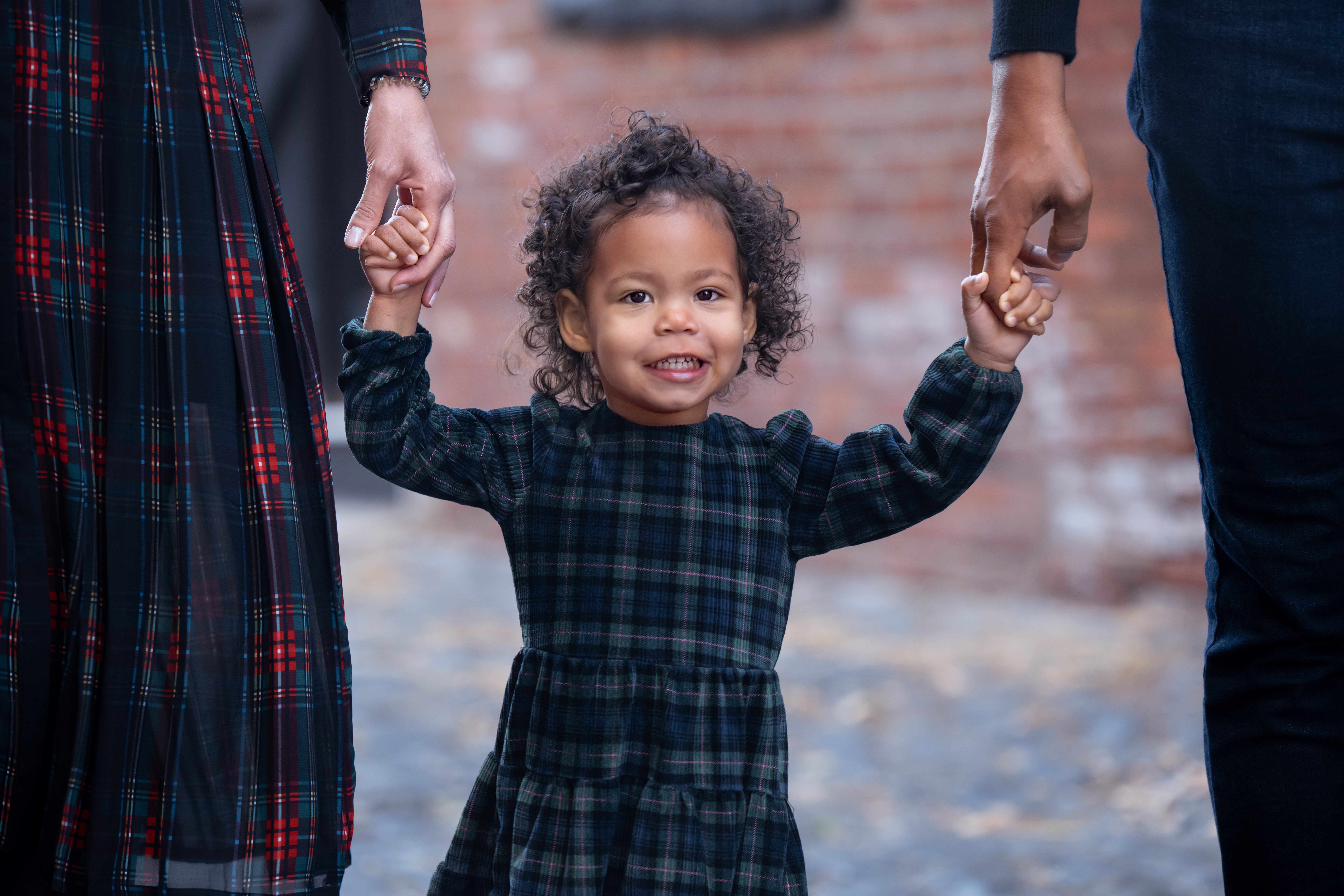 Court Street, Hoboken Family Photographer, Hoboken Children Photographer, New York City Family Photographer, Manhattan Family Photographer, Court Street Hoboken, Cobblestone Street, Fall Family Session, Child holding parents hand, Urban Family Session, Hoboken, Hudson County Photographer,