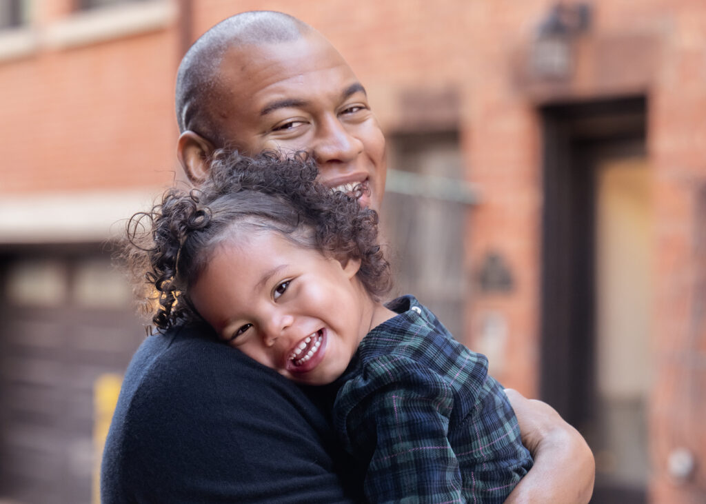 Court Street, Hoboken Family Photographer, Hoboken Children Photographer, New York City Family Photographer, Manhattan Family Photographer, Court Street Hoboken, Cobblestone Street, Fall Family Session, Child Portrait, African American Family, Urban Family Session, Hoboken, Hudson County Photographer, Dad Holding Daughter, Dad Daughter