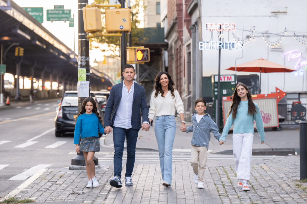 Family walking together in the Meatpacking District during a New York City family photography session.