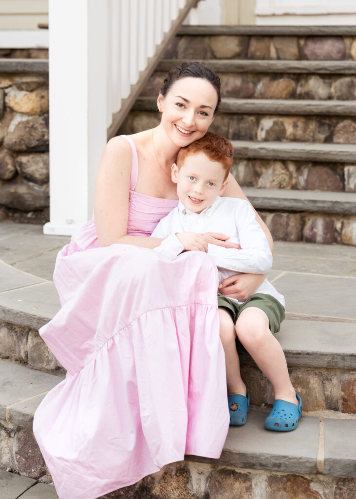 Mother sitting with her young son during a family photography session in New Jersey.